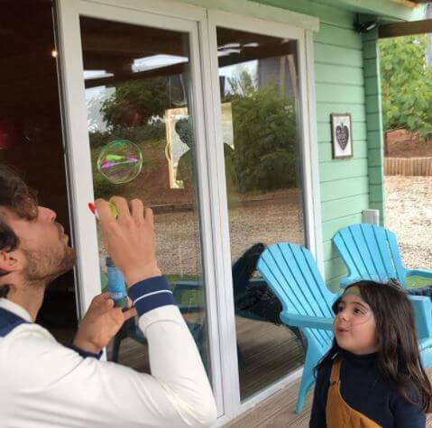 Adriana Gomes's husband, Joao Sousa, with their rumored daughter.